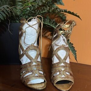 BCBGeneration “Jax” Gold Strappy Heels